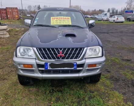 Синій Міцубісі Л 200, об'ємом двигуна 2.5 л та пробігом 250 тис. км за 6528 $, фото 8 на Automoto.ua