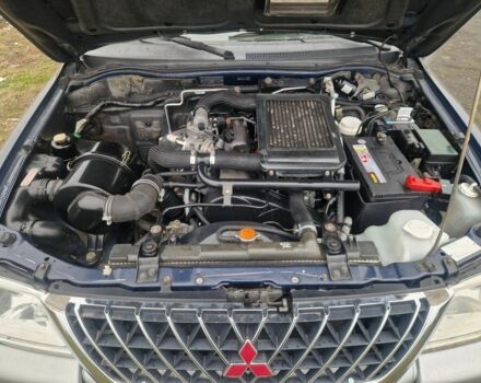 Синій Міцубісі Л 200, об'ємом двигуна 2.5 л та пробігом 250 тис. км за 6528 $, фото 14 на Automoto.ua