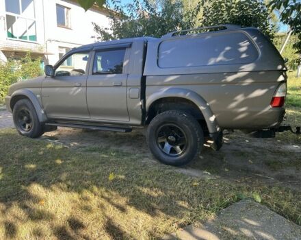 Синій Міцубісі Л 200, об'ємом двигуна 2.5 л та пробігом 347 тис. км за 10213 $, фото 1 на Automoto.ua