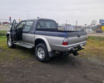 Синій Міцубісі Л 200, об'ємом двигуна 2.5 л та пробігом 250 тис. км за 6528 $, фото 11 на Automoto.ua