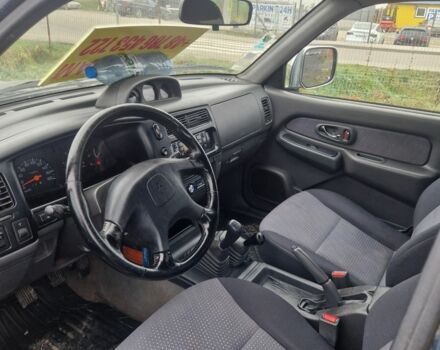 Синій Міцубісі Л 200, об'ємом двигуна 2.5 л та пробігом 250 тис. км за 6528 $, фото 10 на Automoto.ua