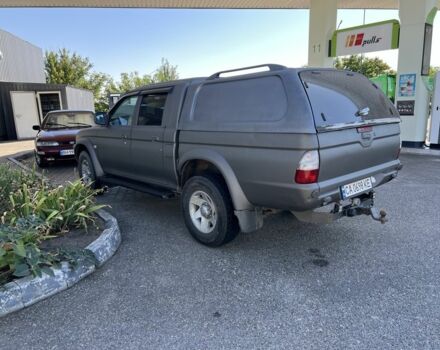 Синій Міцубісі Л 200, об'ємом двигуна 2.5 л та пробігом 347 тис. км за 10213 $, фото 11 на Automoto.ua