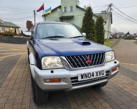 Синій Міцубісі Л 200, об'ємом двигуна 2.5 л та пробігом 105 тис. км за 7574 $, фото 4 на Automoto.ua