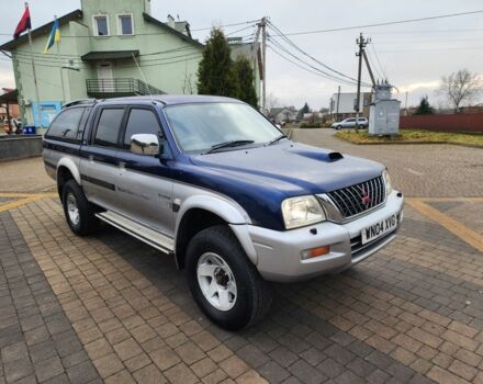 Синій Міцубісі Л 200, об'ємом двигуна 2.5 л та пробігом 105 тис. км за 7574 $, фото 2 на Automoto.ua