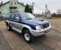 Синій Міцубісі Л 200, об'ємом двигуна 2.5 л та пробігом 105 тис. км за 7574 $, фото 2 на Automoto.ua