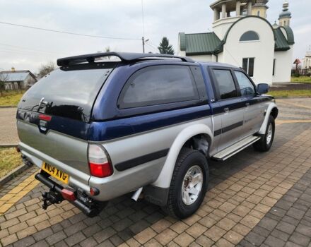 Синій Міцубісі Л 200, об'ємом двигуна 2.5 л та пробігом 105 тис. км за 7574 $, фото 12 на Automoto.ua