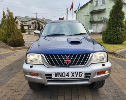 Синій Міцубісі Л 200, об'ємом двигуна 2.5 л та пробігом 105 тис. км за 7574 $, фото 5 на Automoto.ua