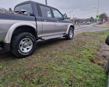 Синій Міцубісі Л 200, об'ємом двигуна 2.5 л та пробігом 250 тис. км за 6528 $, фото 4 на Automoto.ua