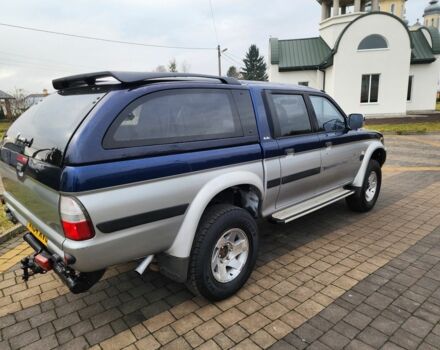 Синій Міцубісі Л 200, об'ємом двигуна 2.5 л та пробігом 105 тис. км за 7574 $, фото 13 на Automoto.ua