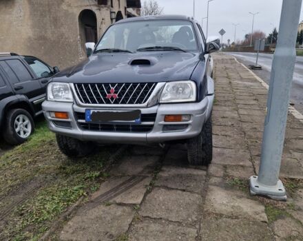 Синій Міцубісі Л 200, об'ємом двигуна 2.5 л та пробігом 250 тис. км за 6528 $, фото 2 на Automoto.ua