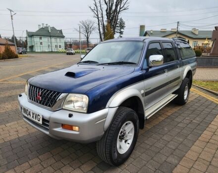 Синій Міцубісі Л 200, об'ємом двигуна 2.5 л та пробігом 105 тис. км за 7574 $, фото 7 на Automoto.ua