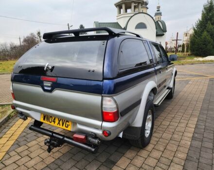 Синій Міцубісі Л 200, об'ємом двигуна 2.5 л та пробігом 105 тис. км за 7574 $, фото 11 на Automoto.ua