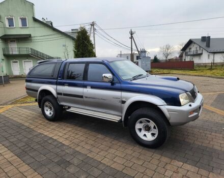 Синій Міцубісі Л 200, об'ємом двигуна 2.5 л та пробігом 105 тис. км за 7574 $, фото 3 на Automoto.ua