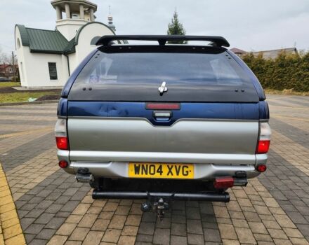 Синій Міцубісі Л 200, об'ємом двигуна 2.5 л та пробігом 105 тис. км за 7574 $, фото 10 на Automoto.ua