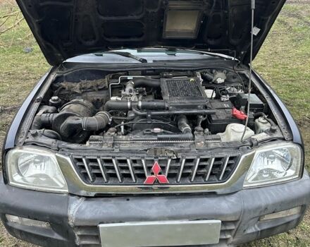 Синій Міцубісі Л 200, об'ємом двигуна 2.5 л та пробігом 321 тис. км за 4455 $, фото 5 на Automoto.ua