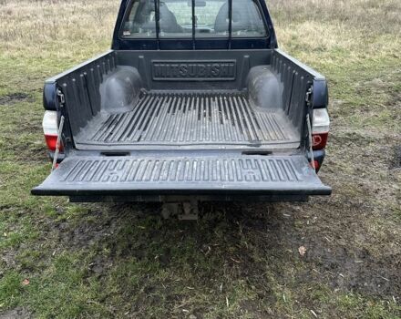 Синій Міцубісі Л 200, об'ємом двигуна 2.5 л та пробігом 321 тис. км за 4455 $, фото 4 на Automoto.ua