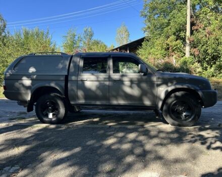 Синій Міцубісі Л 200, об'ємом двигуна 2.5 л та пробігом 347 тис. км за 10213 $, фото 2 на Automoto.ua