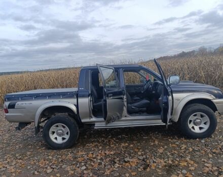 Синій Міцубісі Л 200, об'ємом двигуна 2.5 л та пробігом 276 тис. км за 5300 $, фото 11 на Automoto.ua