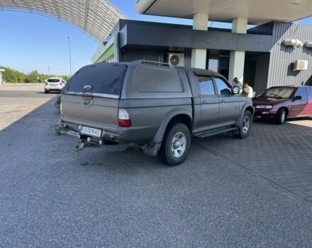 Синій Міцубісі Л 200, об'ємом двигуна 2.5 л та пробігом 347 тис. км за 10213 $, фото 10 на Automoto.ua