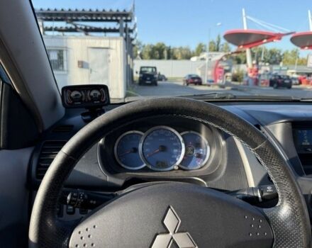 Синий Мицубиси Л 200, объемом двигателя 2.5 л и пробегом 280 тыс. км за 4100 $, фото 6 на Automoto.ua