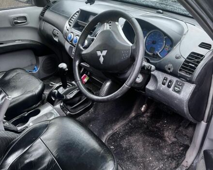 Мицубиси Л 200 2006 в Чугуеве на Automoto.ua Синий Мицубиси Л 200, объемом двигателя 2.5 л и пробегом 250 тыс. км за 6000 $, фото 7 на Automoto.ua