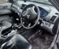 Мицубиси Л 200 2006 в Чугуеве на Automoto.ua Синий Мицубиси Л 200, объемом двигателя 2.5 л и пробегом 250 тыс. км за 6000 $, фото 7 на Automoto.ua