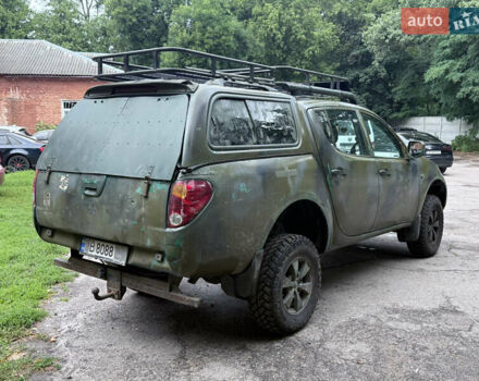 Синій Міцубісі Л 200, об'ємом двигуна 2.45 л та пробігом 250 тис. км за 11999 $, фото 2 на Automoto.ua