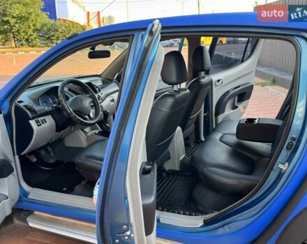 Синий Мицубиси Л 200, объемом двигателя 0 л и пробегом 230 тыс. км за 12500 $, фото 20 на Automoto.ua