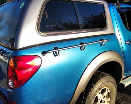 Синій Міцубісі Л 200, об'ємом двигуна 2.48 л та пробігом 224 тис. км за 12350 $, фото 1 на Automoto.ua