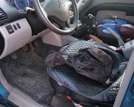 Синій Міцубісі Л 200, об'ємом двигуна 2.48 л та пробігом 224 тис. км за 12350 $, фото 8 на Automoto.ua