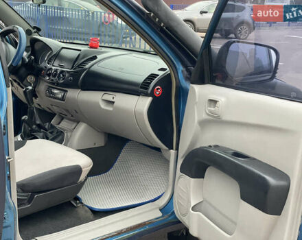 Синій Міцубісі Л 200, об'ємом двигуна 2.48 л та пробігом 469 тис. км за 10300 $, фото 9 на Automoto.ua