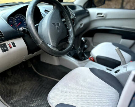 Мицубиси Л 200 2008 в Киеве на Automoto.ua Синий Мицубиси Л 200, объемом двигателя 2.48 л и пробегом 282 тыс. км за 11300 $, фото 7 на Automoto.ua
