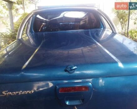 Синій Міцубісі Л 200, об'ємом двигуна 2.48 л та пробігом 322 тис. км за 10500 $, фото 2 на Automoto.ua