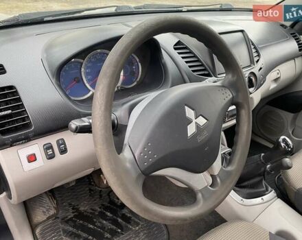 Синий Мицубиси Л 200, объемом двигателя 2.5 л и пробегом 291 тыс. км за 8200 $, фото 10 на Automoto.ua