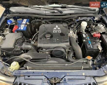 Синий Мицубиси Л 200, объемом двигателя 2.5 л и пробегом 291 тыс. км за 8200 $, фото 17 на Automoto.ua