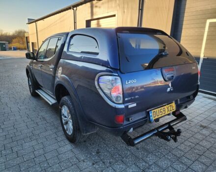 Синий Мицубиси Л 200, объемом двигателя 2.5 л и пробегом 154 тыс. км за 8678 $, фото 7 на Automoto.ua