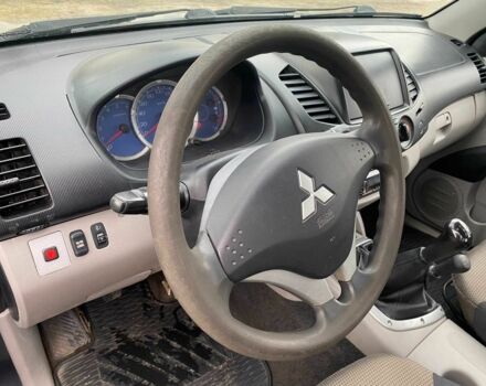 Синий Мицубиси Л 200, объемом двигателя 2.5 л и пробегом 291 тыс. км за 8200 $, фото 9 на Automoto.ua