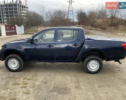 Синий Мицубиси Л 200, объемом двигателя 2.5 л и пробегом 291 тыс. км за 8200 $, фото 6 на Automoto.ua