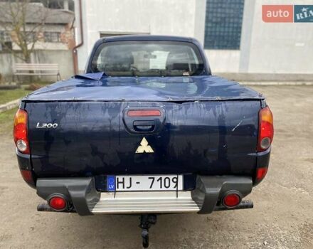 Синий Мицубиси Л 200, объемом двигателя 2.5 л и пробегом 291 тыс. км за 8200 $, фото 5 на Automoto.ua