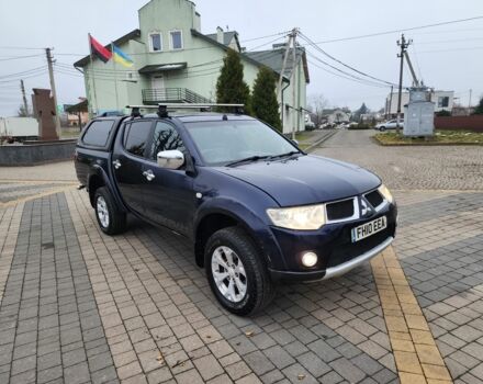 Синий Мицубиси Л 200, объемом двигателя 2.5 л и пробегом 131 тыс. км за 8724 $, фото 1 на Automoto.ua