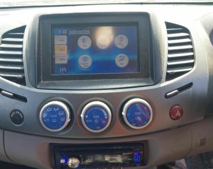 Синий Мицубиси Л 200, объемом двигателя 2.5 л и пробегом 160 тыс. км за 6437 $, фото 8 на Automoto.ua