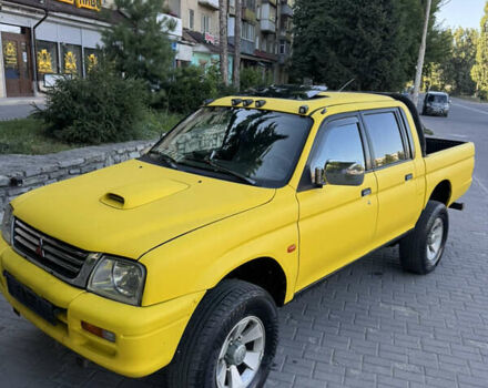 Синій Міцубісі Л 200, об'ємом двигуна 0 л та пробігом 300 тис. км за 6296 $, фото 1 на Automoto.ua