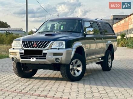 Синій Міцубісі Л 200, об'ємом двигуна 2.5 л та пробігом 190 тис. км за 4900 $, фото 1 на Automoto.ua