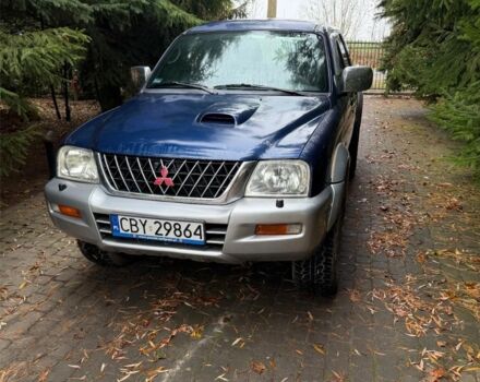 Синий Мицубиси Л 200, объемом двигателя 0 л и пробегом 211 тыс. км за 2600 $, фото 1 на Automoto.ua