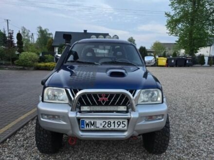 Міцубісі Л 200 2004 у Києві на Automoto.ua Синій Міцубісі Л 200, об'ємом двигуна 0 л та пробігом 213 тис. км за 1870 $, фото 1 на Automoto.ua