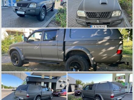 Синий Мицубиси Л 200, объемом двигателя 2.5 л и пробегом 347 тыс. км за 10213 $, фото 1 на Automoto.ua