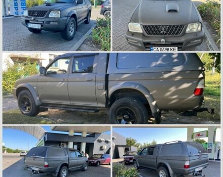 Синій Міцубісі Л 200, об'ємом двигуна 2.5 л та пробігом 347 тис. км за 10213 $, фото 1 на Automoto.ua