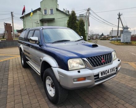 Синій Міцубісі Л 200, об'ємом двигуна 2.5 л та пробігом 105 тис. км за 7574 $, фото 1 на Automoto.ua