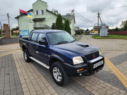Мицубиси Л 200 2004 в Львове на Automoto.ua Синий Мицубиси Л 200, объемом двигателя 2.5 л и пробегом 81 тыс. км за 6984 $, фото 1 на Automoto.ua