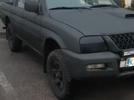 Синий Мицубиси Л 200, объемом двигателя 0 л и пробегом 324 тыс. км за 4700 $, фото 1 на Automoto.ua